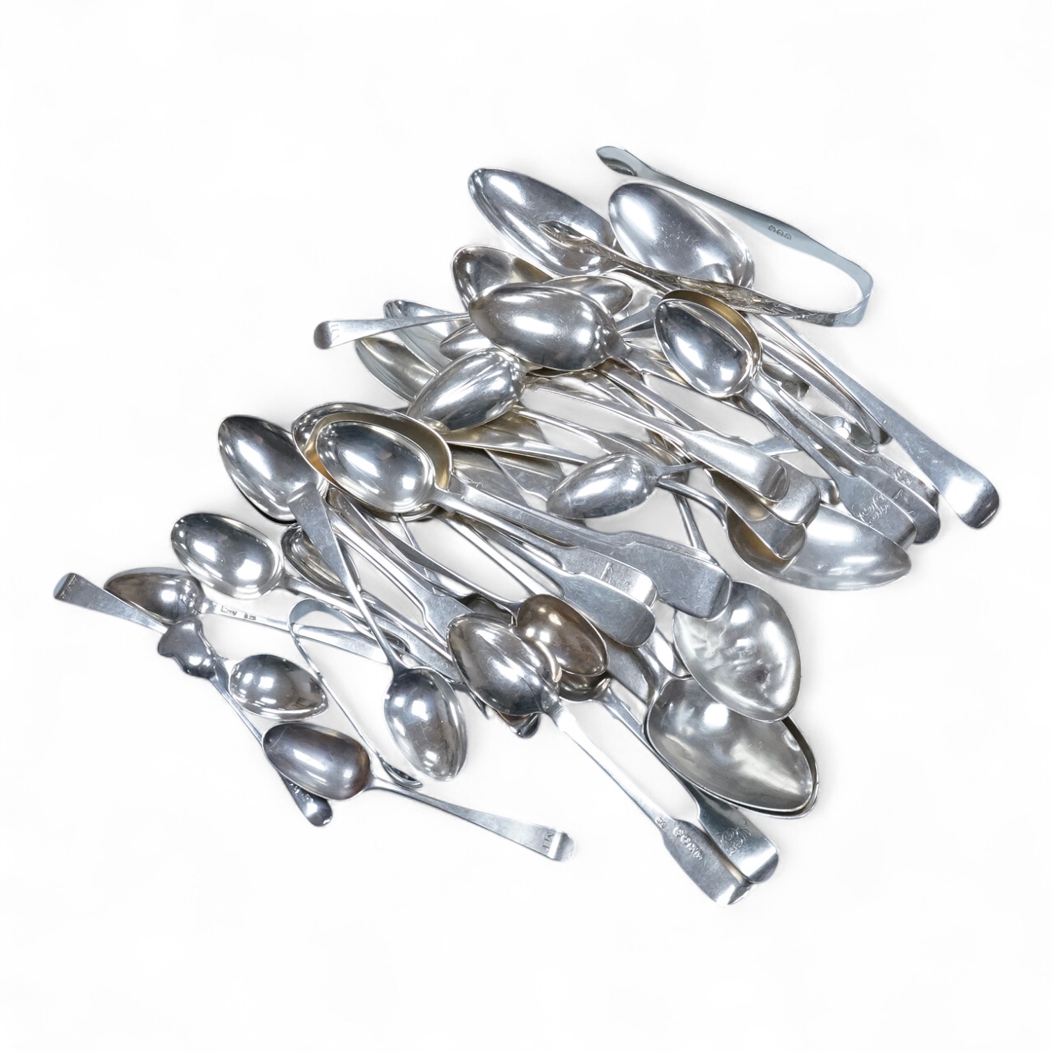 A quantity of assorted mainly 18th and 19th century silver flatware, various patterns, dates and makers, mainly teaspoons but including a pair of George III Old English pattern table spoons, by Hester Bateman, London, 17